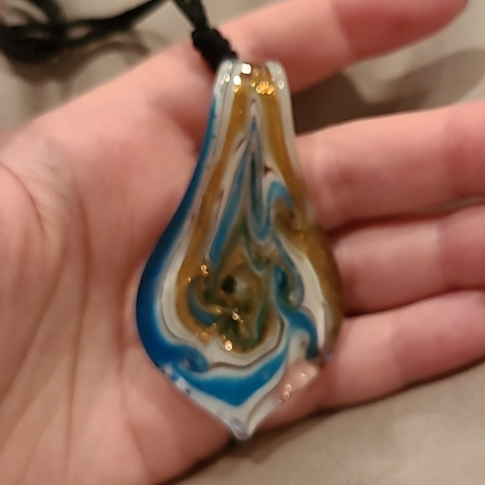 Blue gold and white swirl glass necklace
